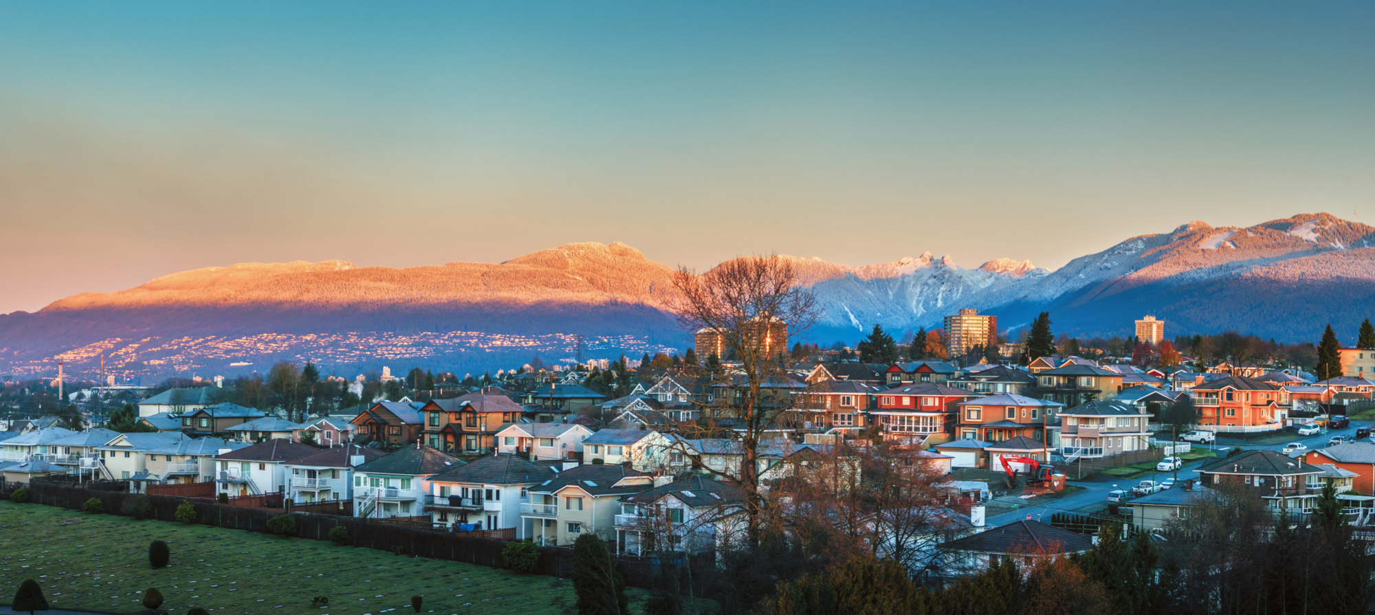 Burnaby community with mountain range in background